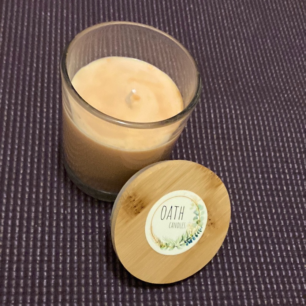 Peach colored unscented soy wax candle